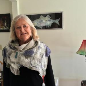 Helen Farnham wearing one of her newest artistic projects — scarves. SUZI THAYER/Boothbay Register