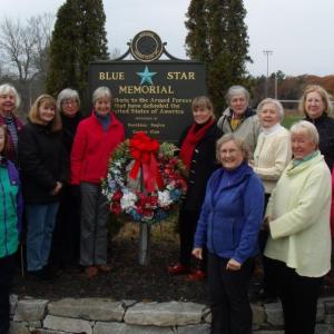Members of the Boothbay Region Garden Club at the Blue Star Memorial on Route 27. Courtesy of Carole Zalucky