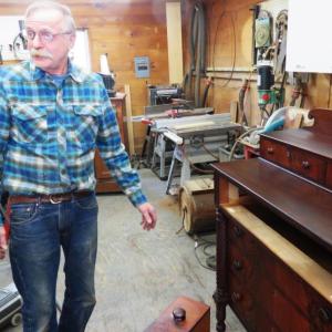 Bill Garland in his furniture restoration workshop. Courtesy of George Jones