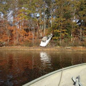 Douglas Stevenson's boat after it went aground on Swan Island in the Kennebec. Courtesy of Maine Marine Patrol