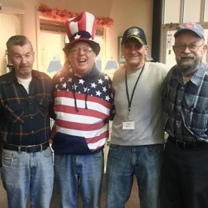 Showing his patriotism, Duane Lewis showed up at the Community Center on Veterans Day dressed like Uncle Sam in honor of the veterans who were playing cribbage. From left are Reid Hodgdon, Duane Lewis, Richard Serino and Don Strickland. Courtesy of Dwight Lewis