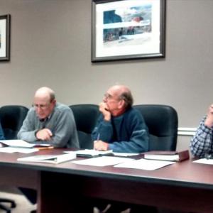 Boothbay Harbor Planning Board members, from left, John Dunsford, William Hamblen, Thomas Churchill and John Hochstein listen to Randy Smith of the Knickerbocker Group. MORGAN CALLAN ROGERS