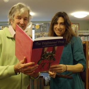 Mimi O'Neill, left, BRGC president and Desiree Scorcia, Boothbay Harbor Memorial Library youth services librarian, discussing “The Frightened Frog.” Courtesy photo