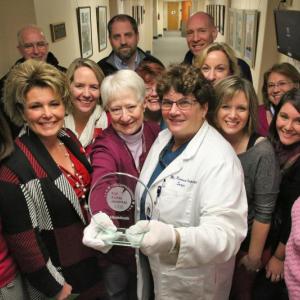 Hospital managers, clinical staff, and employees celebrated the Leapfrog Award on Thursday, Dec. 8, with cake and photographs. Courtesy of Scott Shott