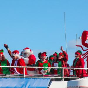 Santa and Mrs. Claus and entourage arrive on the Novelty. DIANE DORBIN/Boothbay Register Harbor Lights 2016, Santa, Novelty