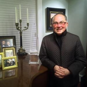 Ron Sanchez with his Design Excellence Award in the music room at his home in Wiscasset. SUZI THAYER/Boothbay Register
