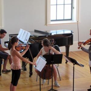 Students rehearsing during last year’s summer workshop. Courtesy of Monica Kelly