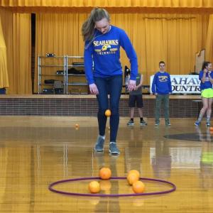 Amy Case competes in the hold-an-orange-between-your-knees-and-get-it-in-the-hoop competition during the BRHS pep rally. It was hard to figure out who won. MORGAN CALLAN ROGERS/Boothbay Register