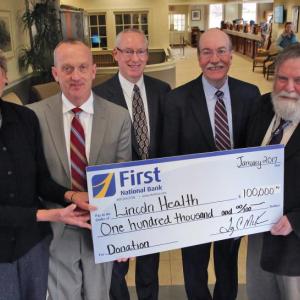Holding a mock donation check are, from left, LincolnHealth Board Member Marva Nesbit, First National Bank CEO Tony McKim, First National Bank Executive Vice President and Treasurer Rick Elder, LincolnHealth President and CEO Jim Donovan and LincolnHealth Chief Medical Officer Russ Mack. Courtesy of Scott Shott/LincolnHealth