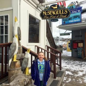 Suzie Edwards stands outside McSeagull’s, where a charity event in her name will be held Feb. 19. SUZI THAYER/Boothbay Register