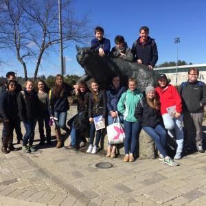 BRHS students gather around the University of New Hampshire Wildcat statue. Pictured are, front from left: Lovely Uberita, John Rollins, Kayla Lewis, Brooke Harmon, Page Brown, Kyle Ames, Maddy Gaudette, Lincoln Hamblett, Jo Shaw, Evy Case, Summer Chamberlin and Tyler Field; top from left: Cameron Crocker, Sam Burnham and Jake Brewer. Courtesy of Kerrin Erhard/BRHS
