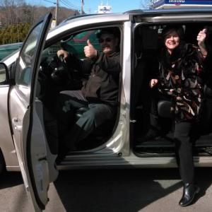 Alan Williams, Hawke Motors manager, and Jane Good, Community Center director, try out the Center’s new van. JANE CARPENTER/Boothbay Register
