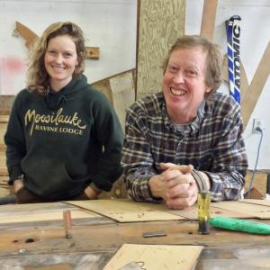 Sarah and David Nutt at his boat building shop on River Road in Edgecomb. SUZI THAYER/Boothbay Register