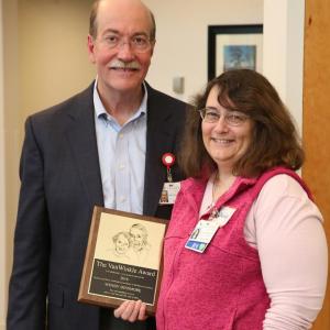 LincolnHealth President Jim Donovan recognized Wendy Dinsmore’s dedication and hard work in October 2016 when she received the Webster and Elise Van Winkle Excellence in Health Care Award. Courtesy of LincolnHealth