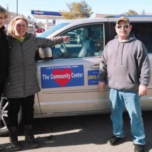 Jane Good, left, thanks Stephanie Hawke and Alan Williams, Hawke Motors manager, for contributing free service for the Center’s van. Courtesy of the Community Center