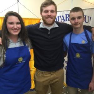 Interact Club members, from left, Molly Thibault, Carter Babcock and Rowan Kristan served spaghetti April 21 during a Boothbay Region Student Aid Fund fundraiser. BILL PEARSON/Boothbay Register