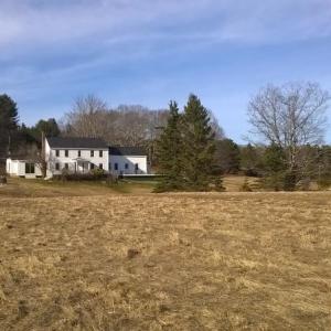In addition to the stunning views and variety of wildlife habitat, this newly acquired BRLT property includes a farmhouse, seasonal cottage and garage. Courtesy of BRLT
