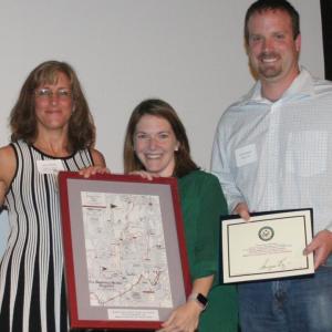 Lorna Weber, left, former BBHRCC president, with Valerie Young and Tim Pinkham of Bigelow Laboratories for Ocean Sciences accepting the Environmental Leader Award in 2016. KEVIN BURNHAM/Boothbay Register