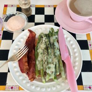 Creamed asparagus on toast, with bacon on the side, and a cup of cappuccino, is a ridiculous breakfast. SUZI THAYER/Boothbay Register