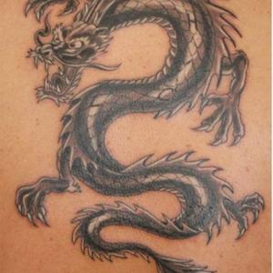 Early 19th-century dragon tattoos like this symbolized a completed voyage to the China Sea. Courtesy photo