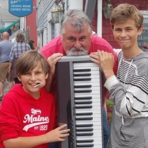 The Beal Boys. Danny Beal's life will be celebrated at the Opera House on Saturday, May 20 from 2 to 5 p.m. Join us as we welcome his family from Jonesport, to meet his Boothbay family. We will come together to remember our friend and music man, the unforgettable Danny Beal. 86 Townsend Avenue, Boothbay Harbor. Above, Danny and his beloved boys, Gordon, left, and Joshua, taken during last year’s Windjammer Days Festival before or after Danny performed. File photo