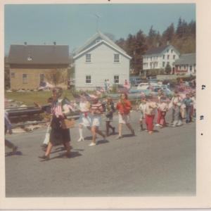 Hope Updegraff leads East Boothbay children across the bridge to Green Landing Cemetery following the Memorial Day parade on May 30, 1972. Courtesy photo