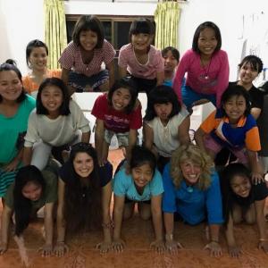 Newcastle’s Kim Erskine, co-owner of Mexicali Blues, visits her Thai “family” at Friends of Thai Daughters’ Sunflower House in Chiang Rai. Courtesy photo