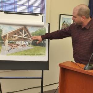 Boothbay Region Land Trust Executive Director Nick Ullo explains plans for constructing a pavilion on the Cross River Preserve. BILL PEARSON/Boothbay Register