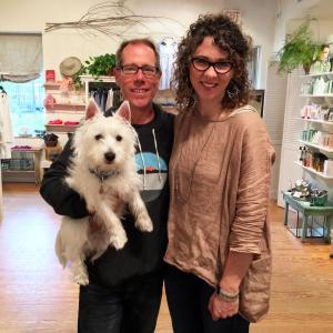 Jay, Kasey and Charlie (the Westie) McNamara, at their Wiscasset boutique, In the Clover. SUZI THAYER/Boothbay Register