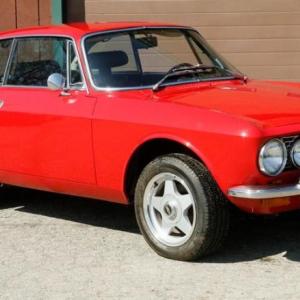 This cute little 1975 Alfa Romeo speed sport coupe could be parked in your garage because it’s on the auction block the first weekend in June! Courtesy of Thomaston Place Galleries 1975 Alfa Romeo 5 speed sport coupe