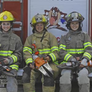 Caitlin Shepherd, left, during a training session at the Lincoln County Fire Academy. Courtesy of the Lincoln County News