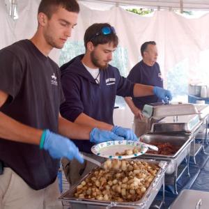Evan Hepburn and Jesse Peters serve up breakfast to benefit the Boothbay Harbor Fire Department. ART MAYERS/Boothbay Register