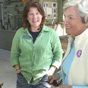 Irene Barber, left, therapeutic horticulture coordinator at Coastal Maine Botanical Gardens, and Holly Smith chat in front of Lerner Garden of the Five Senses regarding her work and scholarship support. Robert Mitchell photo