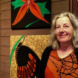 Katenia Keller with her paintings. Courtesy of Polly Smith Katenia Keller