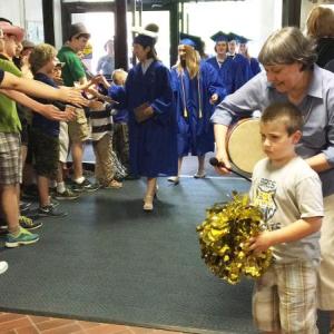 Seniors head into BRES for the second annual Senior Walk. SUZI THAYER/Boothbay Register
