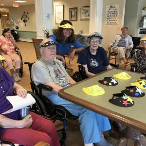 St. Andrews Village residents don their visors made during a Garden Therapy session. Courtesy of Carole Zalucky