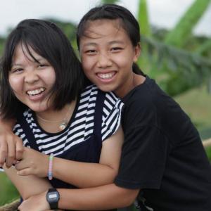Faii, left, and On, right are two of the 15 Daughters that live at the Sunflower House in Chiang Rai, Thailand. The Aug. 4 Sunflower Celebration supports the education, shelter and emotional support they receive through Friends of Thai Daughters program. Courtesy photo