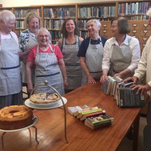 Southport Library Aides enjoy a good laugh before getting to work sorting books and baking pies for the upcoming Book and Bake Sale at the Southport Library on Friday, Aug. 4. Pictured from left are Barb Lally, Marie Oates, Nan Jackson, Anne Gobes (Aides president), Kathy Bugbee, Sandra Seifert and Jean Hawley. Courtesy of Helen Meserve