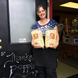 Jennifer Ingham stands in the doorway of her popcorn shop, Cameron Clan Kettle Corn in Wiscasset. SUZI THAYER/Boothbay Register