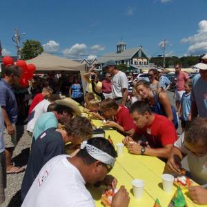 Contestants work at finishing their waffles during a recent contest at Wannawaf. File photo