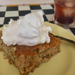 A piece of Foxtrot Cardamom Cake with whipped cream (with some fresh ground black pepper added) and a side of Basil Heyden’s bourbon with a few frozen blueberries and some cardamom simple syrup. SUZI THAYER/Boothbay Register