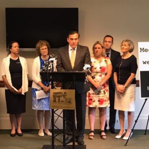State Rep. Stephanie Hawke (R-Boothbay Harbor), third from right, listens as former Maine GOP Chairman Rick Bennett speaks at an Augusta press conference explaining why he and four state legislators sent a letter to the Secretary of State’s office regarding changing wording on this fall’s Medicaid expansion referendum question. Courtesy photo