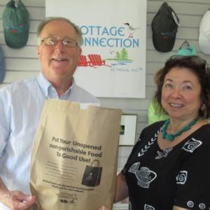 Fleet Davies, co-president of the Food Pantry and Audrey Miller, co-owner of Cottage Connection Vacation Rentals. Courtesy photo