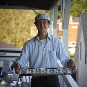 Lucas Myers and his mobile shucking station bring O’Oysters to the Village during the Wiscasset Art Walk. Courtesy of Lucia Droby