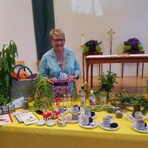 BRGC President Claire Tomlin with fresh display of herbs and spices prepared for presentation to September general meeting of the garden club. Courtesy of Kathleen Marty/BRGC