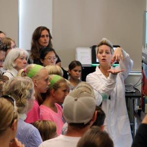 Research Technician Liz Fergusson speaks to a tour group during Bigelow Laboratory's annual open house on July 14. The nonprofit laboratory was recently evaluated by Charity Navigator and awarded its highest rating for accountability, transparency, and financial responsibility. Courtesy photo