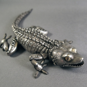 Sculptor and goldsmith Oleg Konstantinov’s gecko on exhibit at Trifles in Wiscasset. Courtesy of Lucia Droby Oleg Konstantinov
