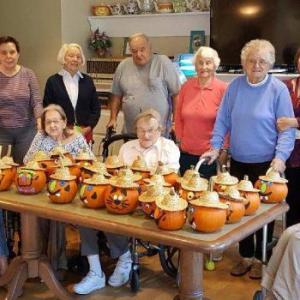 BRGC Garden Therapy team and residents of Gregory Wing and Safe Havens gather to create Halloween jack-o’-lanterns Oct. 3. Courtesy of Jerie Phinney/Gregory Wing
