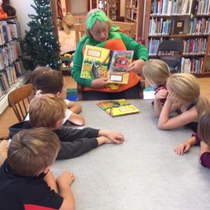 BRGC Youth Chair Linda Bonin reading "The Saved Seed" at the Southport library to a group of Southport Central School students. Courtesy of Sandra Seifert