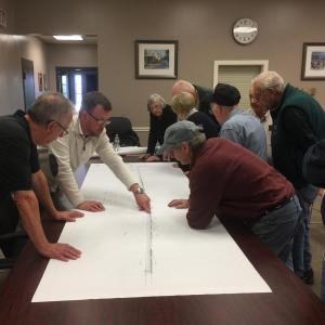 At the Oct. 18 meeting, Steve Sawyer, far left, and Shane Kelly, explain accessibility during construction of the sidewalk. JOSEPH CHARPENTIER/Boothbay Register